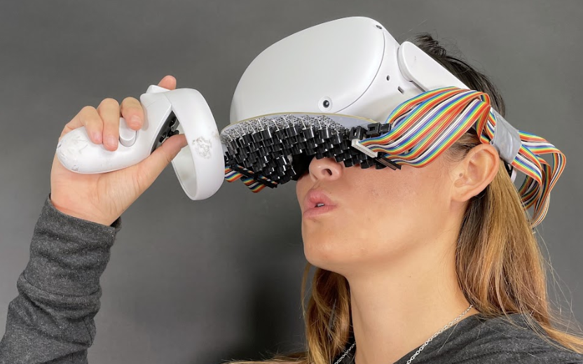 Photo of the Mouth Haptics prototype, showing a device for delivering tactile feedback inside the oral cavity.